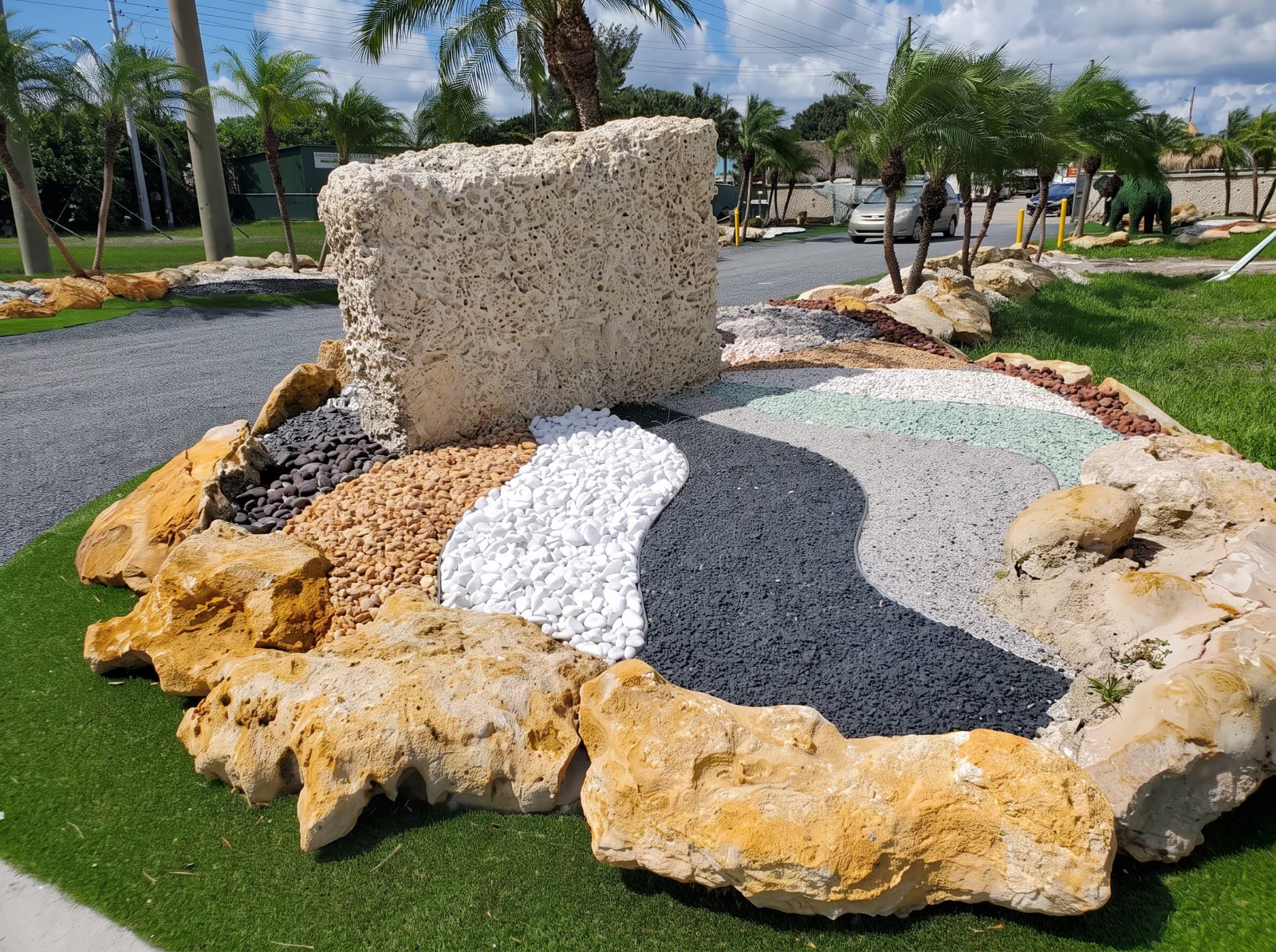 Olimar Stone outdoor display of decorative stone in curved color bands